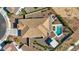 Overhead aerial view of home featuring outdoor kitchen, pool, and desert landscaping at 4651 N 204Th Ave, Buckeye, AZ 85396