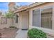 Inviting front entryway with a security door, desert landscaping, and a 'hello' welcome mat for a warm greeting at 473 S Ash St, Gilbert, AZ 85233