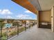 Inviting outdoor balcony equipped with a built-in BBQ, offering scenic neighborhood views at 5000 N Camelback Ridge Dr # 409, Scottsdale, AZ 85251