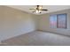 This bedroom has neutral walls and a single window with blinds at 509 W Princeton Ave, Gilbert, AZ 85233