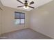 Well-lit bedroom with ceiling fan and window at 509 W Princeton Ave, Gilbert, AZ 85233