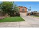 Two-story home featuring a well-maintained lawn and a spacious driveway at 509 W Princeton Ave, Gilbert, AZ 85233