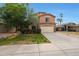 Two-story home featuring a well-maintained lawn and a spacious driveway at 509 W Princeton Ave, Gilbert, AZ 85233