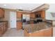 Kitchen featuring granite countertops, stainless appliances, and wood cabinets at 509 W Princeton Ave, Gilbert, AZ 85233