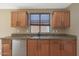 Kitchen featuring stainless appliances, granite countertops, and wood cabinets at 509 W Princeton Ave, Gilbert, AZ 85233