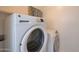 Laundry room with GE washer and Samsung dryer at 509 W Princeton Ave, Gilbert, AZ 85233