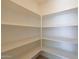 This pantry is equipped with bright white shelves offering lots of storage space at 509 W Princeton Ave, Gilbert, AZ 85233