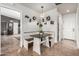 Comfortable dining area with built-in bench seating and decorative wall shelving at 5318 W Aire Libre Ave, Glendale, AZ 85306