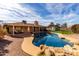 Beautiful backyard pool and covered patio, perfect for outdoor entertaining and relaxation at 5318 W Aire Libre Ave, Glendale, AZ 85306