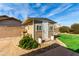 Well-maintained backyard shed surrounded by lush landscaping, adding charm to the outdoor space at 5318 W Aire Libre Ave, Glendale, AZ 85306