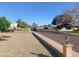 Neighborhood street showcasing well-maintained homes, mature trees, and a peaceful atmosphere at 5318 W Aire Libre Ave, Glendale, AZ 85306