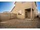 Large backyard with gravel landscaping, block walls, and a covered patio area at 5430 W Odeum Ln, Phoenix, AZ 85043