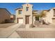 Inviting home featuring a neutral color palette and low maintenance desert landscaping at 5430 W Odeum Ln, Phoenix, AZ 85043