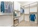 Spacious walk-in closet with custom organization, including hanging racks, shelving, and a vanity area at 5921 E Ocupado Dr, Cave Creek, AZ 85331