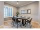 Contemporary dining room with modern table, seating for six, with neutral wall color and decor at 5921 E Ocupado Dr, Cave Creek, AZ 85331