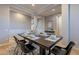 Cozy dining room with table for six, neutral color palette, and modern decor at 5921 E Ocupado Dr, Cave Creek, AZ 85331