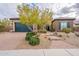 Beautiful home with desert landscaping, brick pathway, and a charming front facade at 5921 E Ocupado Dr, Cave Creek, AZ 85331