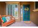 Inviting front porch with a bench, decorative wreath, and stylish shutters at 5921 E Ocupado Dr, Cave Creek, AZ 85331