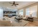 Spacious living room with an open concept, connecting to the kitchen and dining area at 5921 E Ocupado Dr, Cave Creek, AZ 85331