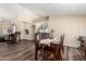 Inviting dining area with a view of the home's interior and living spaces at 6401 W Irma Ln, Glendale, AZ 85308