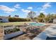 Backyard with in-ground pool, shed, grassy area, and garden at 6524 N 13Th St, Phoenix, AZ 85014