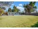 Expansive backyard features a well-maintained lawn and sparkling pool, ideal for outdoor enjoyment at 6524 N 13Th St, Phoenix, AZ 85014