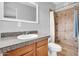 Clean bathroom featuring a tiled shower, toilet and vanity with granite countertop at 6524 N 13Th St, Phoenix, AZ 85014