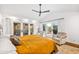 Main bedroom with ceiling fan and french doors leading to the outdoor patio at 6845 N Hillside Dr, Paradise Valley, AZ 85253