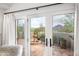 View from bedroom of a peaceful patio with a fountain and mountain views at 6845 N Hillside Dr, Paradise Valley, AZ 85253