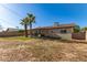 Spacious backyard with covered patio and block fencing offers privacy at 699 W Shannon St, Chandler, AZ 85225