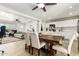 Open-concept dining area with seating for six, connecting the kitchen and living areas seamlessly at 699 W Shannon St, Chandler, AZ 85225