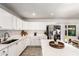 Bright kitchen features ample cabinet space and sliding doors to the outside at 699 W Shannon St, Chandler, AZ 85225