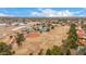 Vibrant aerial view of the community showing the baseball field, sports fields, and tennis court at 9090 N 86Th Pl, Scottsdale, AZ 85258