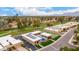 Beautiful aerial view of community pool and tennis courts near residences at 9090 N 86Th Pl, Scottsdale, AZ 85258