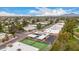 Expansive aerial view of neighborhood and a community tennis court, pool and rec center at 9090 N 86Th Pl, Scottsdale, AZ 85258