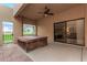 Covered patio with a hot tub, offering a private outdoor space for relaxation and enjoyment at 9090 N 86Th Pl, Scottsdale, AZ 85258