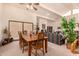 Open-concept dining area connected to living room with bright, natural light at 9090 N 86Th Pl, Scottsdale, AZ 85258