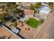 Aerial view of the property highlighting the spacious backyard and convenient storage shed at 99 W Circle Dr, Florence, AZ 85132