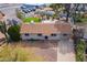 Aerial view of the home showcasing the roof, backyard, landscaping, and surrounding area at 99 W Circle Dr, Florence, AZ 85132