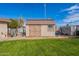 A shed provides extra storage space in the property's backyard at 99 W Circle Dr, Florence, AZ 85132