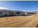 Beautiful single-story home with a well-manicured lawn and desert landscaping at 10019 W Shasta Dr, Sun City, AZ 85351