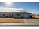 Charming single-story home with light brick, desert landscaping, and an attached two-car garage at 10019 W Shasta Dr, Sun City, AZ 85351