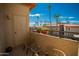 Relaxing balcony featuring cozy chairs and vibrant flower planters, perfect for enjoying the community views at 10410 N Cave Creek Rd # 2007, Phoenix, AZ 85020