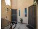 Exterior shot of a building entrance featuring a door and a small window at 10410 N Cave Creek Rd # 2007, Phoenix, AZ 85020