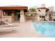 Inviting community pool area with lounge chairs for relaxation and a refreshing swimming experience at 10410 N Cave Creek Rd # 2007, Phoenix, AZ 85020