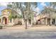 Charming home exterior featuring a cozy, two-story design and landscaped front yard at 110 N 66Th Ave, Phoenix, AZ 85043