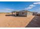 Expansive backyard featuring a covered patio perfect for outdoor entertaining and relaxation at 1236 E Silver Reef Dr, Casa Grande, AZ 85122