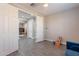 Open doorway to a spacious living room, complete with furniture and tile flooring at 1236 E Silver Reef Dr, Casa Grande, AZ 85122