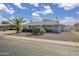 Charming single-story home with xeriscape front yard and mature landscaping at 12408 N Cherry Hills W Dr, Sun City, AZ 85351