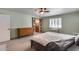 Bedroom with a sliding barn door leading to the bathroom at 12515 W Prospect Dr, Sun City West, AZ 85375